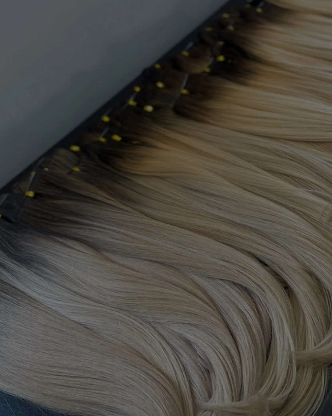 Cortinas de extensiones en tonos rubios